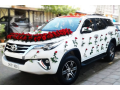fortuner-car-rent-for-wedding-near-me-small-0